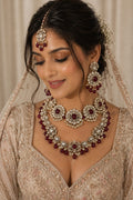 Maroon Kundan Polki bridal choker set with matching earrings and maang tikka - rich red Indian bridal jewellery for wedding day, reception and sangeet ceremonies