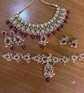 Ruby Red Kundan Polki Bridal Jewellery Set with Choker, Long Necklace, Earrings, Maang Tikka and Rings by Ganesh Kundan Jewellery
