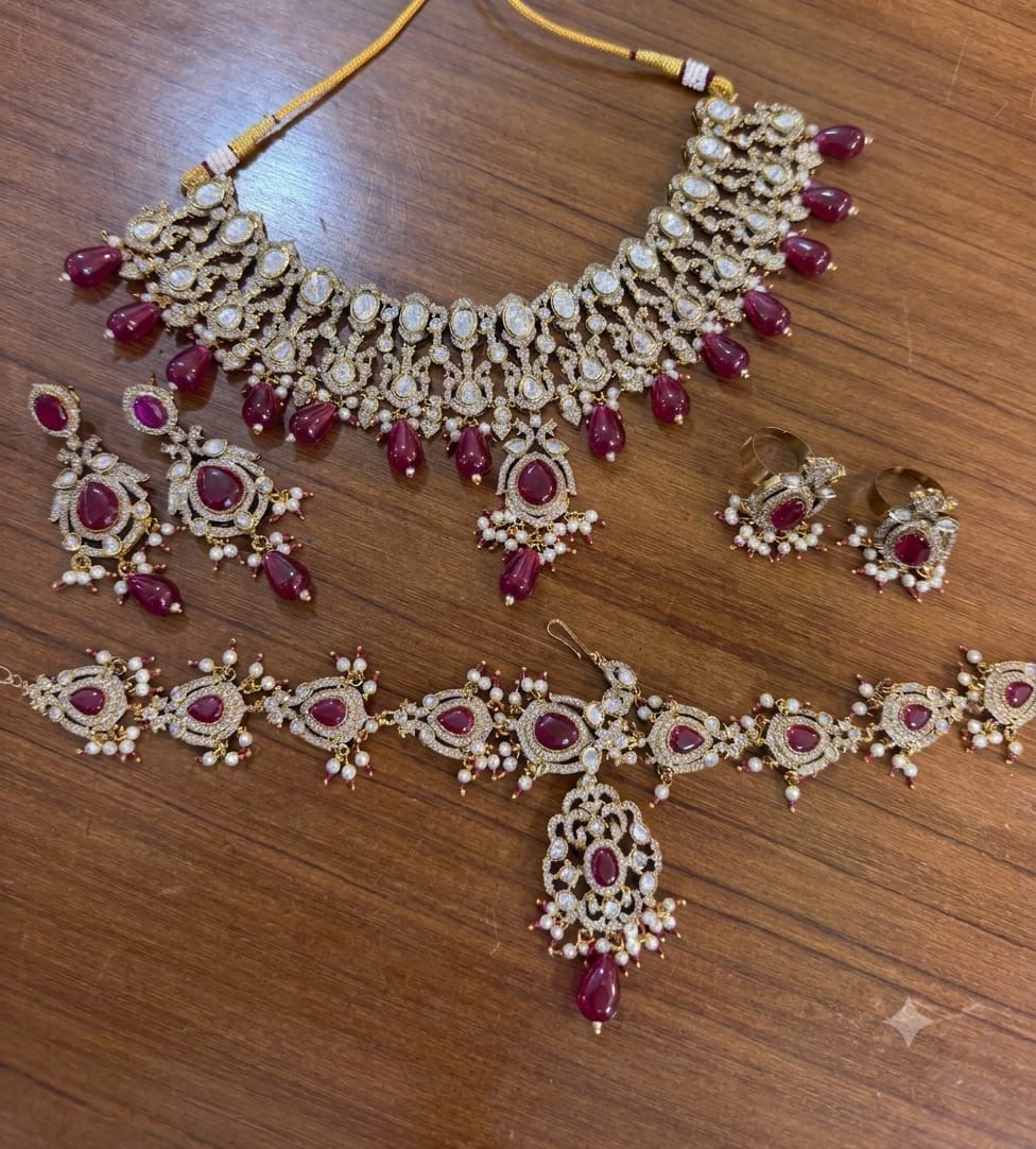 Ruby Red Kundan Polki Bridal Jewellery Set with Choker, Long Necklace, Earrings, Maang Tikka and Rings by Ganesh Kundan Jewellery
