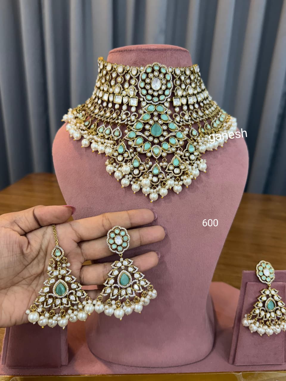 Bridal kundan polki choker jewellery set with mint green stones and pearl earrings