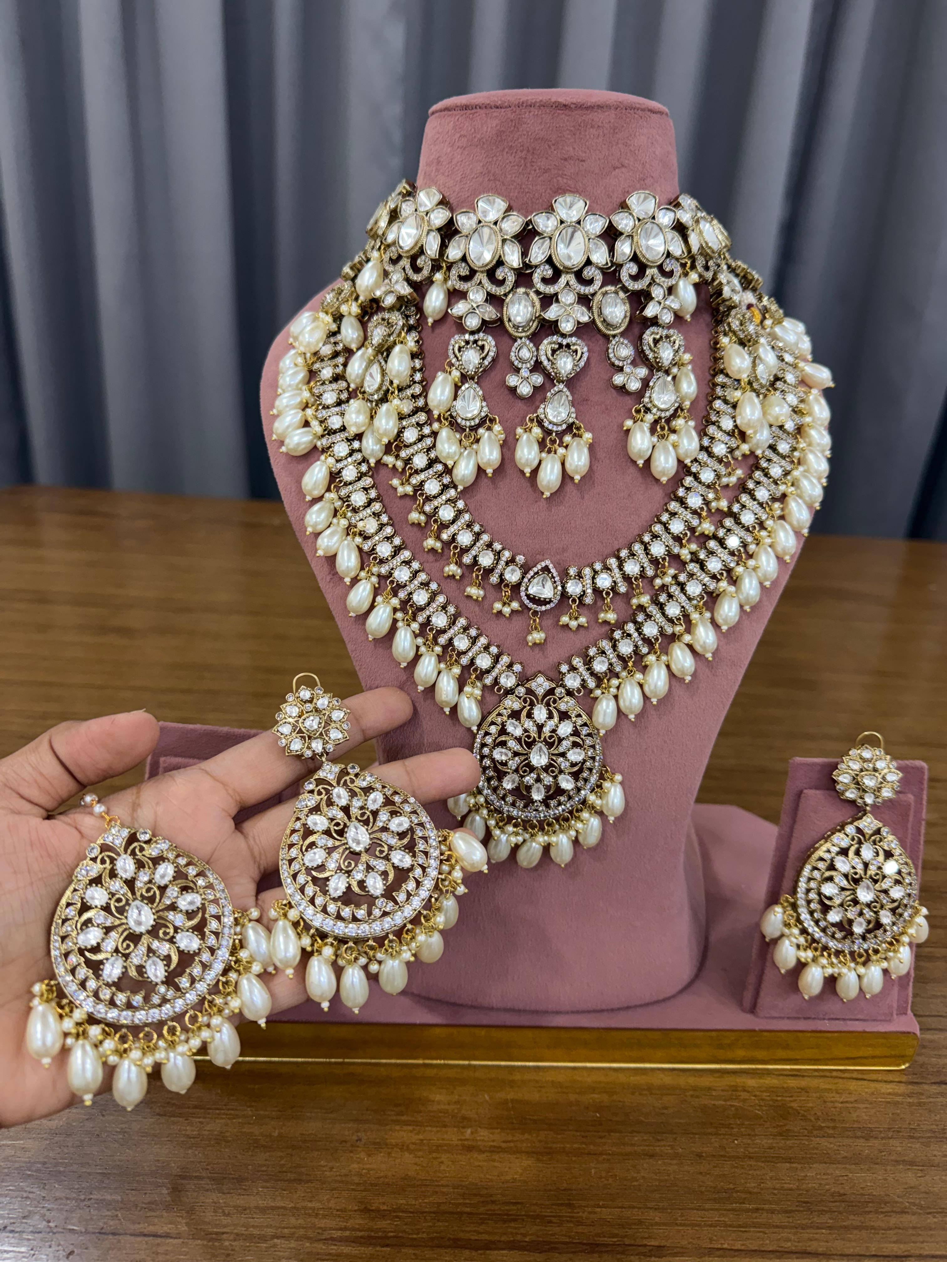 Bridal Kundan Polki jewellery set with choker and long necklace pearl earrings