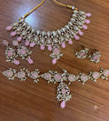 Blush Pink Kundan Polki Bridal Jewellery Set with Choker, Long Necklace, Earrings, Maang Tikka and Rings by Ganesh Kundan Jewellery

