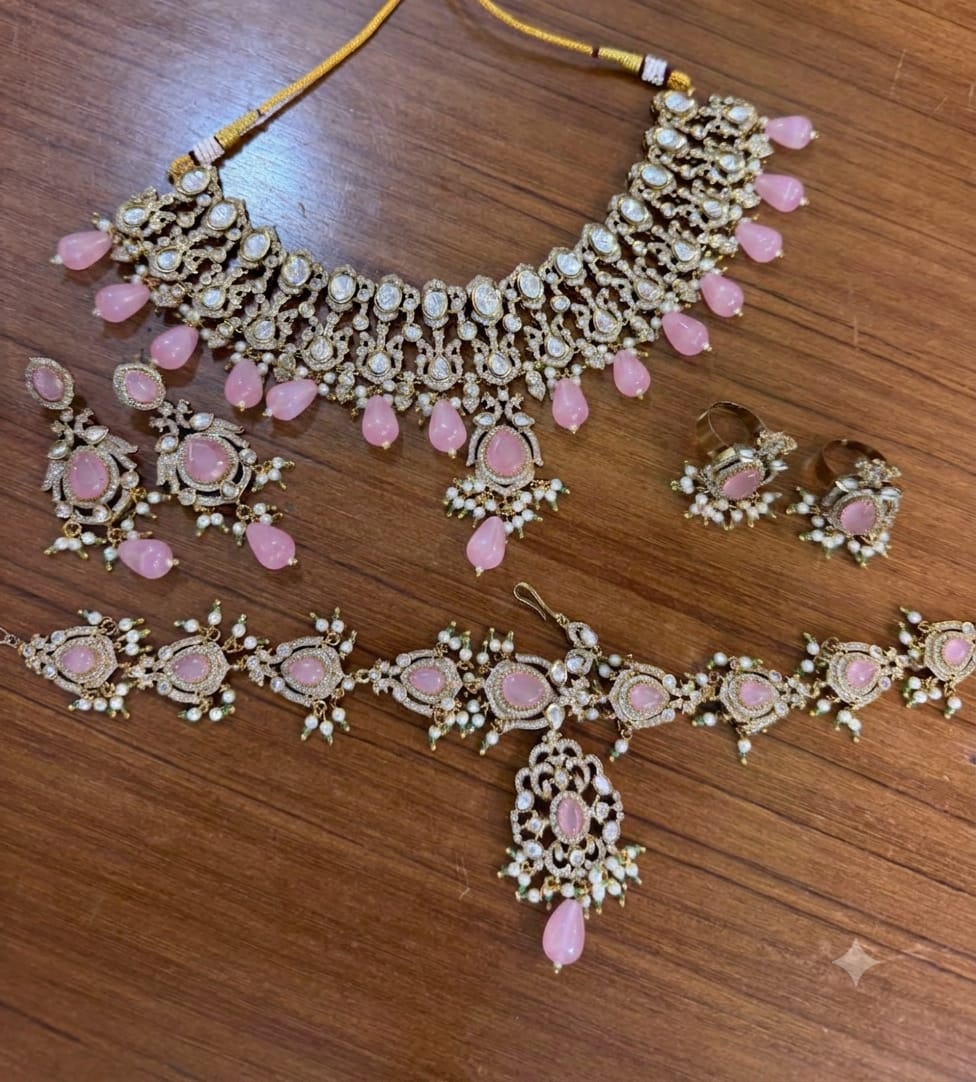 Blush Pink Kundan Polki Bridal Jewellery Set with Choker, Long Necklace, Earrings, Maang Tikka and Rings by Ganesh Kundan Jewellery

