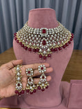 Ruby Red Kundan Choker Bridal Jewellery Set by Ganesh Kundan & Polki.