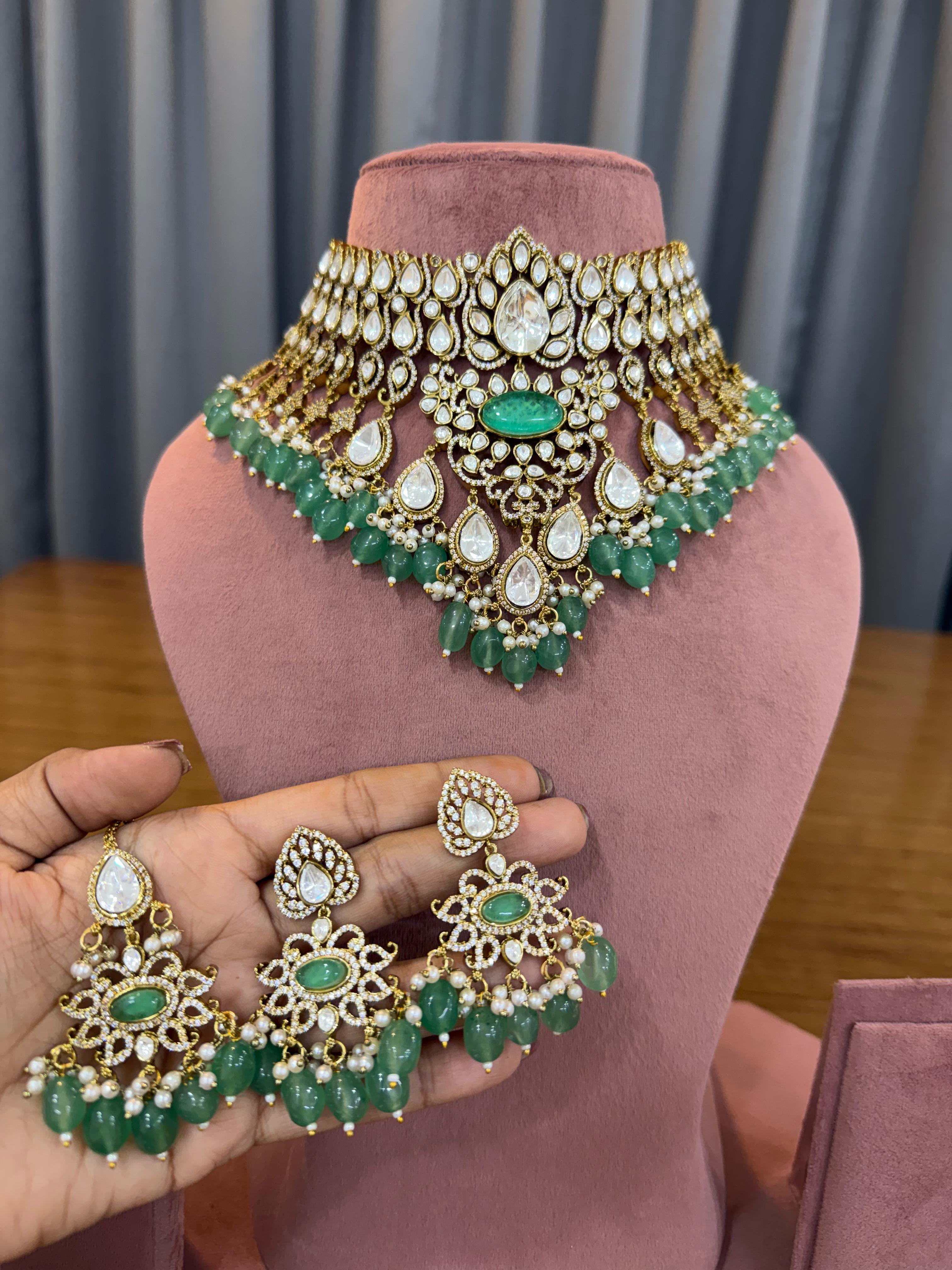 Bridal Kundan Polki jewellery set with green stones choker earrings maang tikka