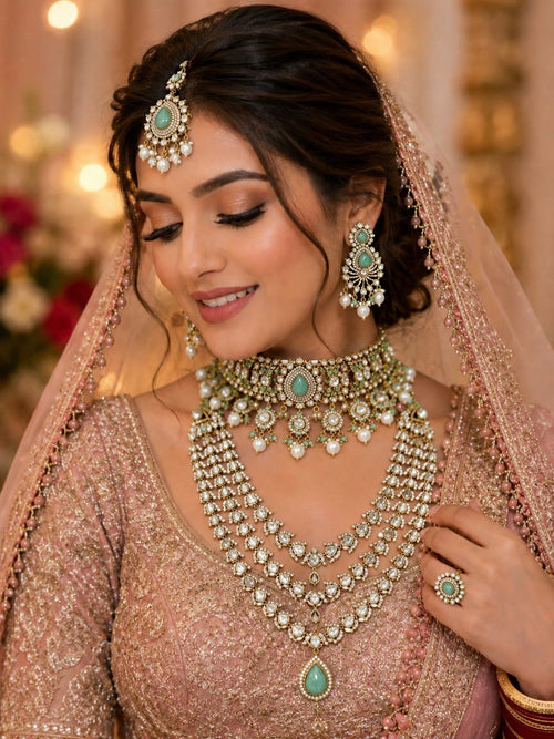 Green Kundan Polki bridal jewellery set with layered long necklace and earrings