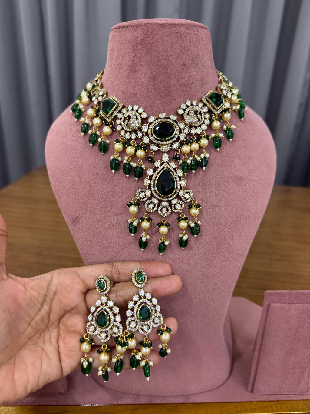 Bridal kundan polki jewellery set with green stones statement necklace and earrings