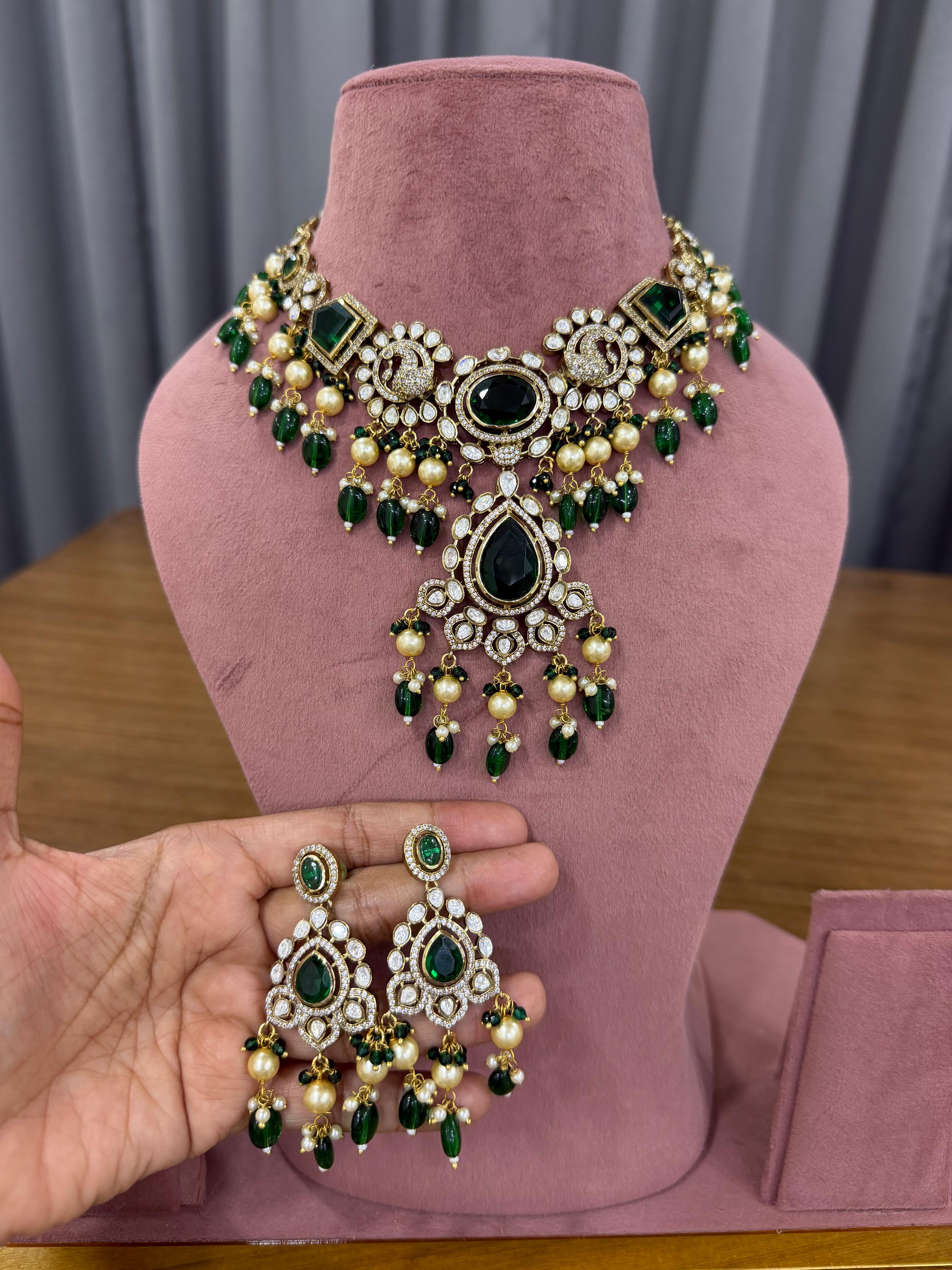 Bridal kundan polki jewellery set with green stones statement necklace and earrings