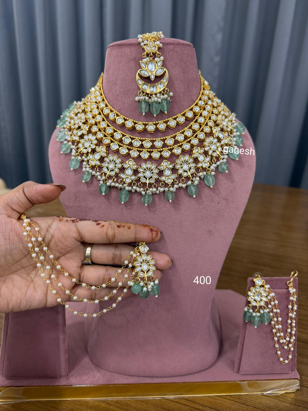 Bridal kundan polki jewellery set with green beads choker necklace earrings maang tikka