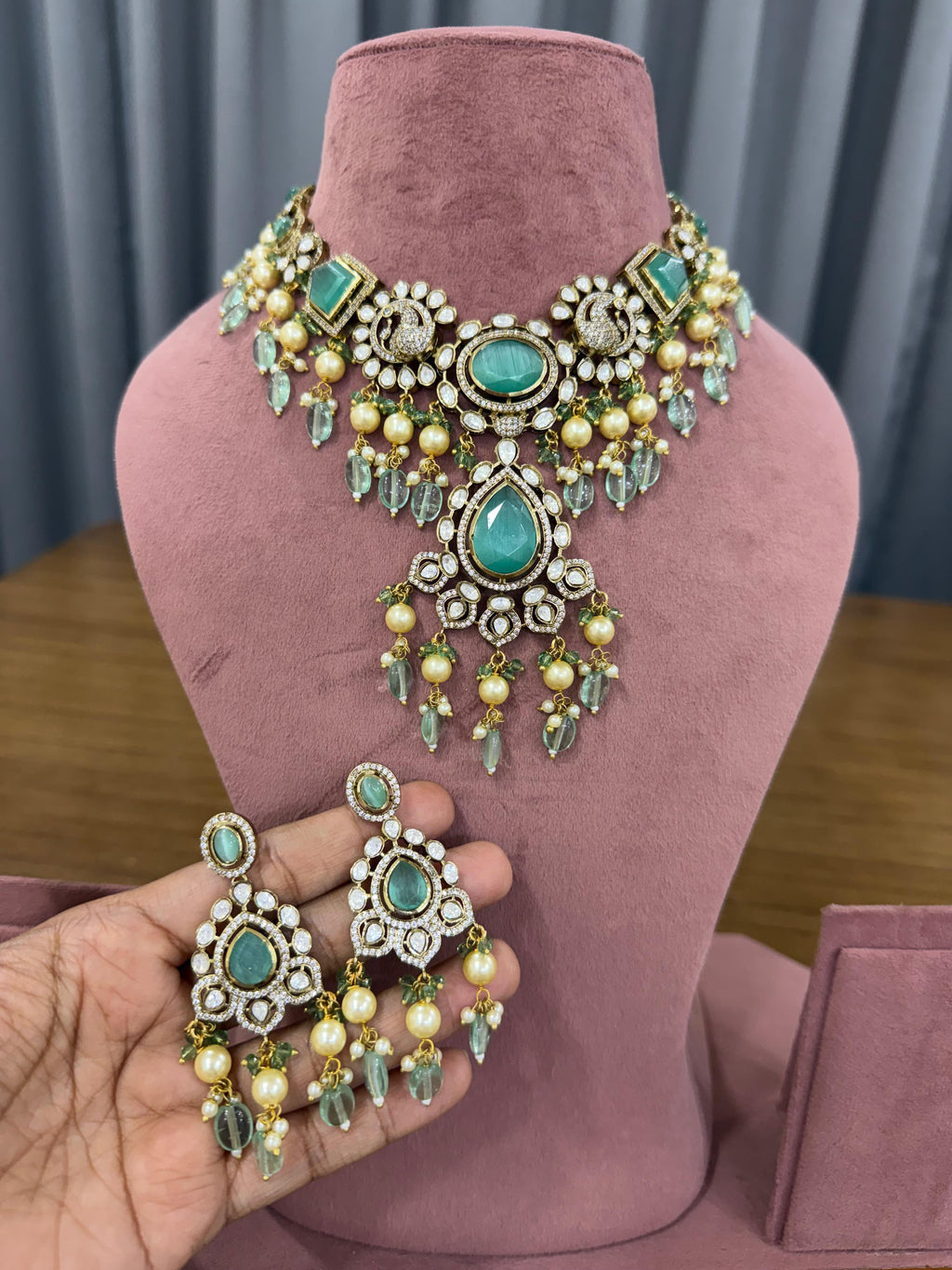 Bridal kundan polki jewellery set with mint green stones statement necklace and earrings