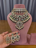 Royal bridal kundan polki jewellery set with green stone detailing
