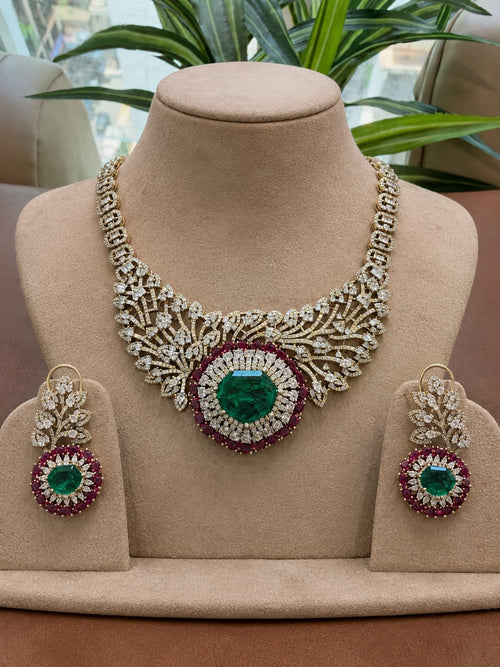 Emerald green and ruby bridal Kundan Polki jewellery set with statement necklace and earrings