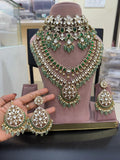 Green kundan polki bridal jewellery set with choker and long necklace