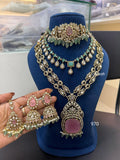 Pink and mint green bridal Kundan Polki jewellery set with choker and long necklace.