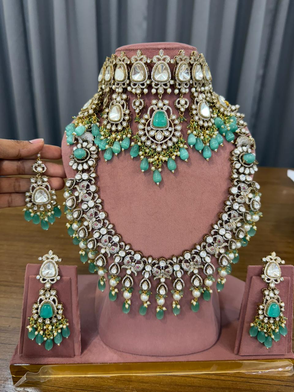 Bridal mint green kundan polki jewellery set with choker and long necklace