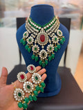 Ganesh Kundan and Polki Bridal Choker Set with Green Beads and Ruby Accent