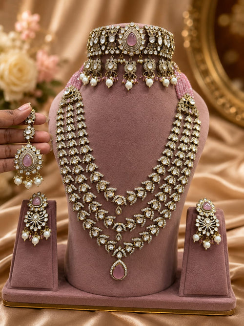 Rose pink and gold bridal Kundan Polki jewellery set with choker layered necklace and earrings