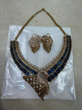 Blue bridal kundan polki jewellery set with choker and peacock pendant