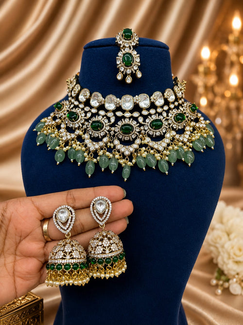 Dark green Kundan Polki bridal jewellery set with choker tikka and Jhumka earrings