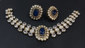 Royal blue artificial Polki Kundan choker jewellery set with matching earrings by Ganesh Jewellery