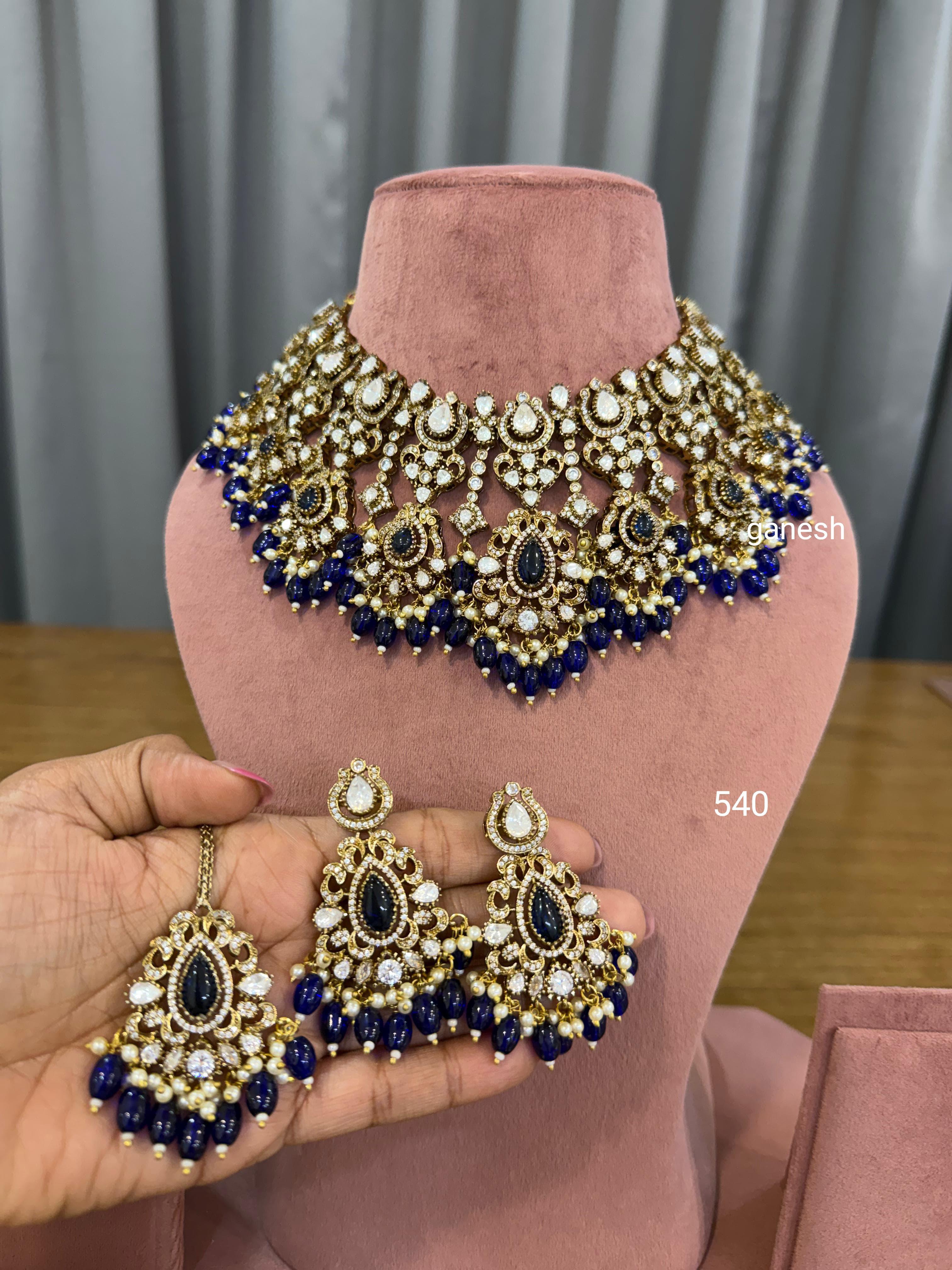 Bridal Kundan Polki jewellery set with blue stones choker earrings maang tikka