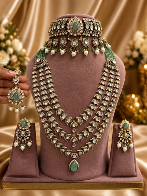 Green and gold bridal Kundan Polki jewellery set with choker, long necklace and earrings