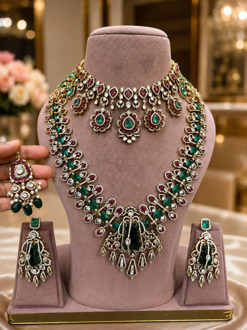Emerald green and ruby bridal Kundan Polki jewellery set with choker long necklace and earrings